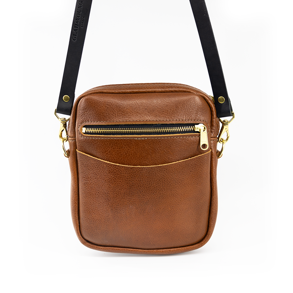 Black and tan cross top body bag